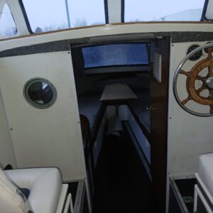 Onedin motorboot opruimen ophalen slopen afvoeren